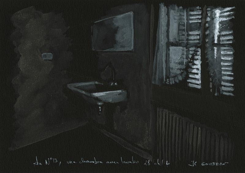 Une chambre avec lavabo